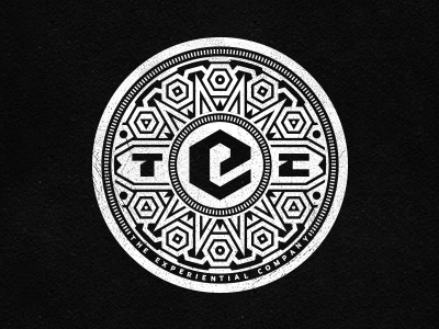 TEC Emblem - white ancient aztek circular design emblem etnic geometry hexagonal hexagons logo mandala art mayan ornamental pattern sewer cap spirograph symmetry synergy the experiential company triangular tribal