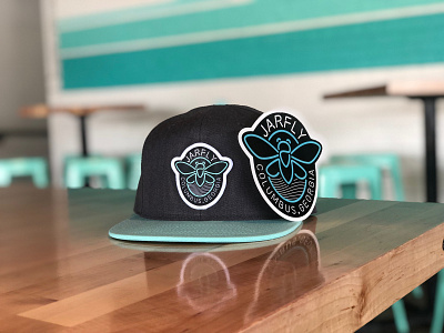 Jarfly® Hat & Sticker brand brand identity branding bugs cicadas jarfly logo logo design neon neon sign restaurant teal