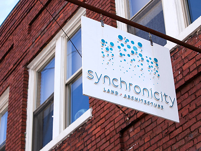 Synchronicity Signage architecture branding city logo signage skyline urban