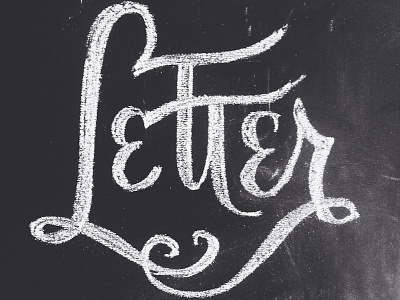 Chalking letters.