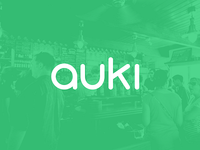 Auki font green logo round typographic