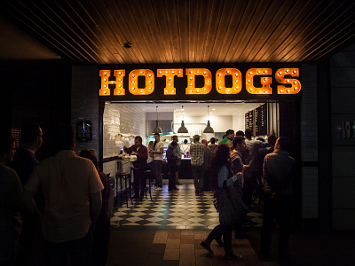 H O T D O G S branding done and dusted hot dogs huge lettering lights logo