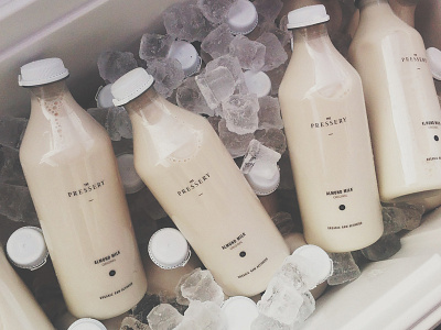 The Pressery Milk Bottles 2014 almond artisan brand corporate identity logo milk pressery the typography