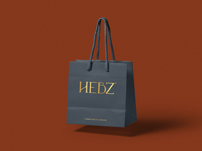 Hebz on Grey brand branding classy design exclusive gold grey identity logo paper typography