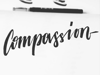 Compassion brushscript calligraphy handlettering lettering typography