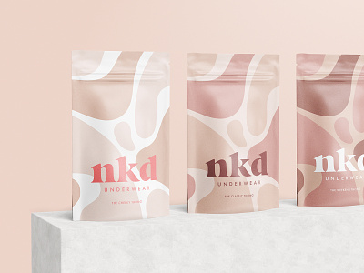 NKD Pouch Packaging abstract branding ethical fashion feminine fluid giving back inclusive lifestyle logotype neutral colors packaging pattern pouch skincare sustainable underwear