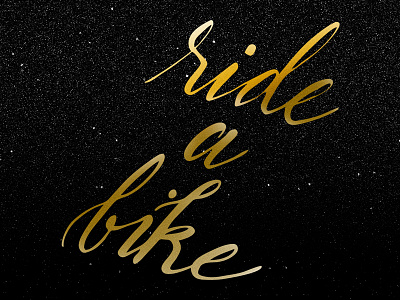 Ride a Bike bike gold hand lettering lettering