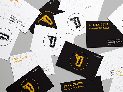 Devolve Moto business cards black branding business cards design gold moto print raleigh