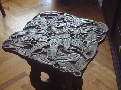 Woodcarved table table
