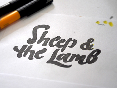 S&L black calligraphy hand writing lamb lettering logo sheep