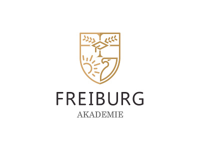 Freiburg Akademie Sprachschule academy eagle education freiburg germany gradudation hat logo olive shield sun university