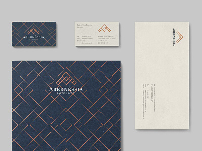 Collateral for Abernéssia business card campos do jordão copper envelope folder holding identity metallic print