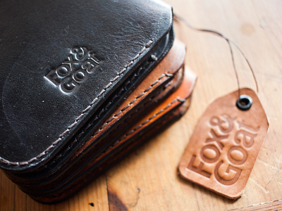 Logo and product design for a leather company fashion fox goat handmade leather leather wallet logo stamp tag wallet