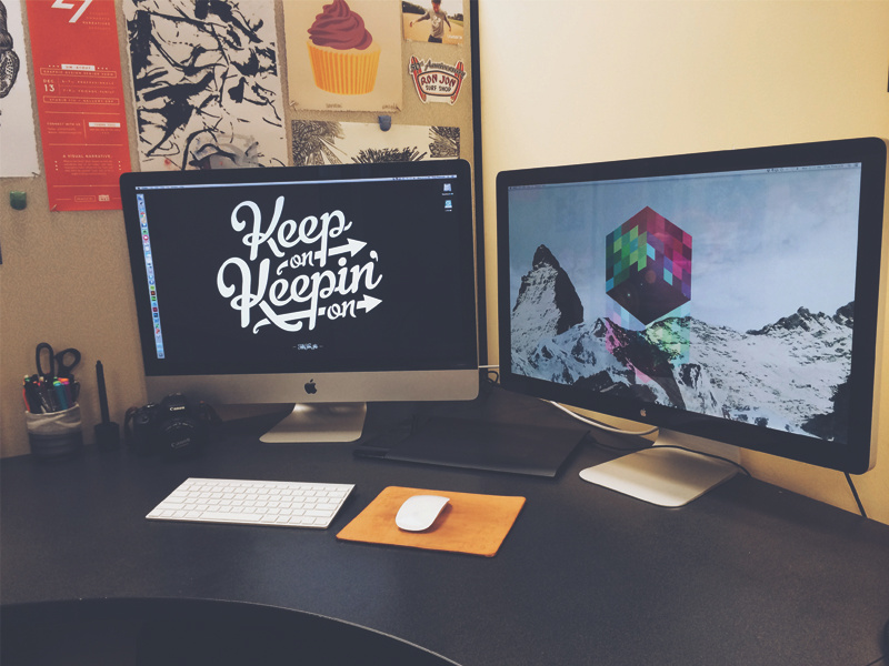 Everyone loves a workspace shot desk office workspace apple imac thunderbolt display wacom tablet canon desktop computer ugmonk