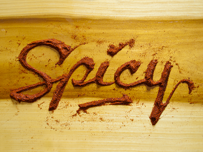 Spicy Chili cayenne chili chili powder design food food type food typography hand lettering illustration lettering red script spicy wood wood grain yellow