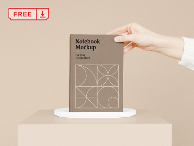 Free Notebook with Hand Mockup