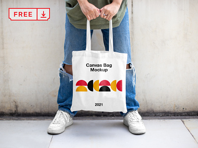 Free Men Holding Canvas Bag Mockup bag branding canvas bag design download free freebie identity logo mockup mockups psd template typography
