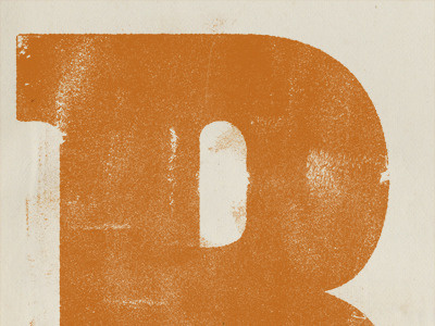Distressed R ink orange r wood type