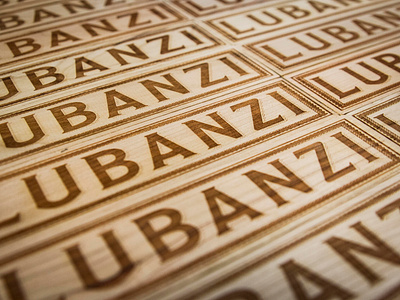 Lubanzi Taps beer cut design designer engrave illustration kugo laser logo product richmond rva signage signmaking typography wood