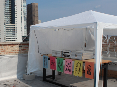 Roof Party Setup chicago house party signage stripped and chewed