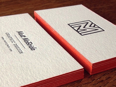 Letterpressed black business card cotton cranes identity letterpress lettra logo orange painted edges