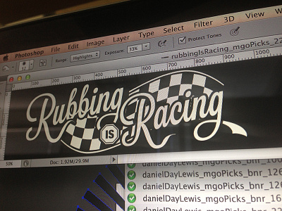Rubbing Is Racing banner black and white checkered flag racing simple