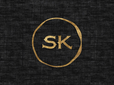 SK branding gold leaf hand tooled logo mark monogram