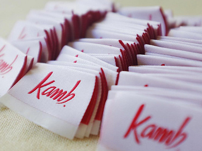 Kamb brand embroidery fabric label lettering logo