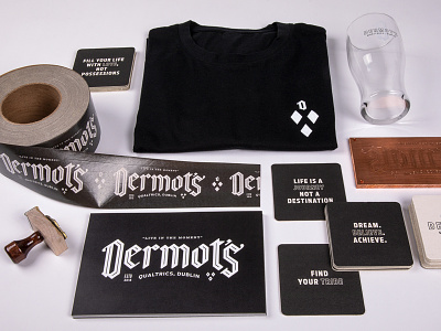 Dermot's apparel bar blackletter branding coaster dublin glass ireland pint pub qualtrics shirt stamp tape typography