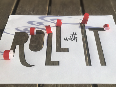 Roll with It core values experimenting paper typography
