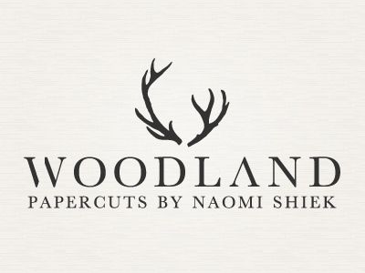 Woodland Papercuts Logo brand identity branding gestalt logo