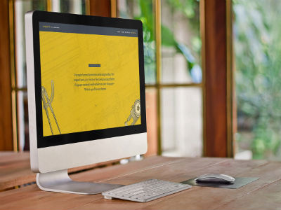 iMac on a Wooden Desk