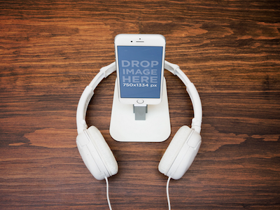 Headphones around White iPhone 6 on a Stand app marketing design mockup digital pr ios apps iphone 6 mockup responsive screenshot generator startup marketing ux design