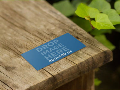 Business Card Mockup on a Wooden Table