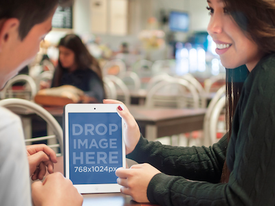 White iPad Mockup of Two Teenagers at School Cafeteria app marketing ios apps ipad ipad mini ipad mini mockups ipad mockups startup marketing