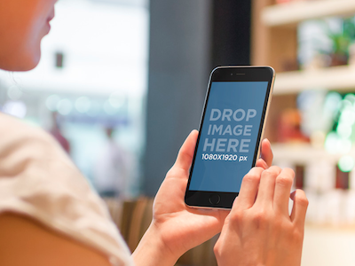 Amazing Mockup! Woman Using iPhone 6 at Tea Shop app marketing apple devices appstore marketing ios apps iphone iphone 6 iphone 6 plus iphone apps seo startup marketing