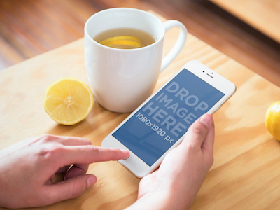 iPhone 6 Mockup Featuring a Cup of Lemon Tea apple digital marketing iphone 6 mockup iphone 6 template mockup generator photorealistic mockup smartphone mockup