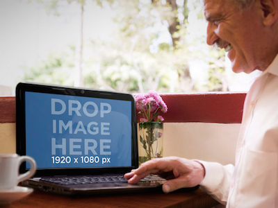Mockup of Elderly Man Using HP Laptop In a Terrace hp laptop hp laptop mockup mockup generator online marketing photorealistic mockup place it