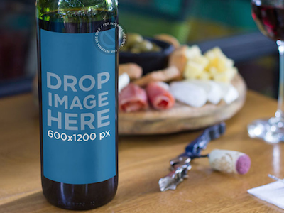 Wine Bottle Standing on Top of a Table at a Restaurant bottle mockup bottle template digital marketing label mockup label stock photo label template online marketing tools stock photo template ux design web marketing wine bottle mockup wine bottle template