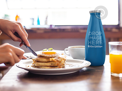 Label Mockup Featuring a Juice Bottle at a Breakfast Table