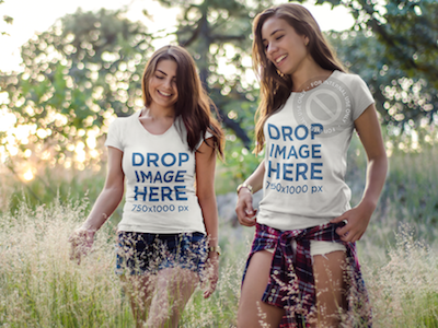 T-Shirt Mockup Featuring Two Cheerful Friends Hiking