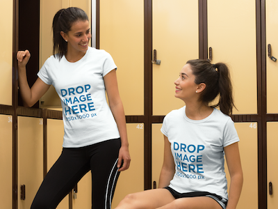 T-Shirt Mockup of Two Friends at a Gym's Locker Room clothing mockup clothing template mockup generator mockup tools stock photo mockup stock photo template t shirt mockup t shirt template tshirt mockup tshirt mockup generator visual marketing