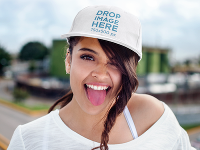 Young Woman Making a Funny Face Hat Mockup