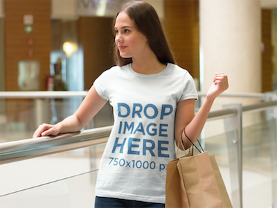 T-Shirt Mockup of a Woman at a Shopping Mall