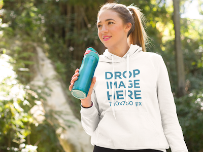 Young Woman at a Park Drinking Water Hoodie Mockup clothing mockup clothing template hoodie mockup hoodie mockup generator hoodie mockup template hoodie stock photo hoodie template mockup generator mockup template mockup tools visual marketing tools