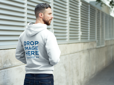 Hoodie Mockup Featuring a Man on his Way to the Park clothing mockup clothing template hoodie mockup hoodie mockup generator hoodie mockup template hoodie stock photo hoodie template mockup generator mockup template mockup tools visual marketing tools
