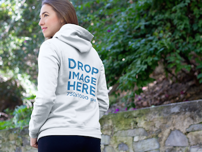 Hoodie Mockup Featuring a Young Woman at a Park