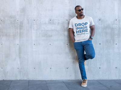 Black Man Leaning on a Concrete Wall T-Shirt Mockup digital marketing mockup generator mockup template mockup tools stock photo mockup stock photo template t shirt mockup t shirt mockup generator t shirt mockup template t shirt template visual marketing campaign web marketing