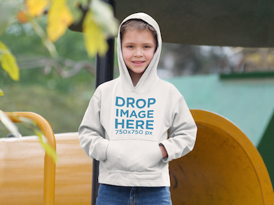 Hoodie Mockup of a Young Boy at a Playground by Placeit on Dribbble