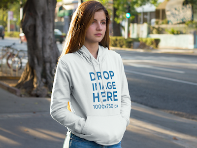 Girl Standing on a Sidewalk Hoodie Mockup